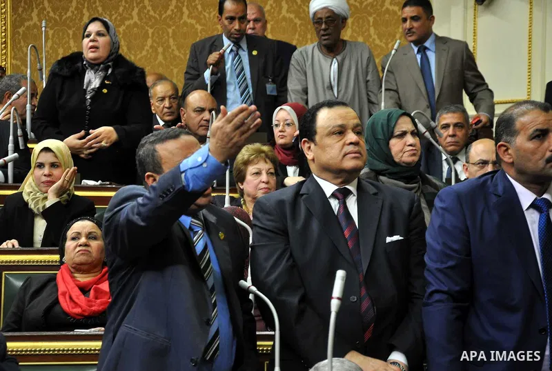Members of Egypt's Parliament discuss during the inaugural session, the first to convene in three years, in Cairo, Egypt, Sunday, Jan. 10, 2016. The 596-seat assembly, elected in November and December, packed with suppor...