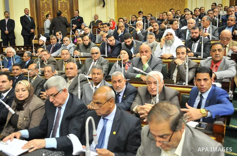 Members of Egypt's Parliament attend the session of the Parliament, in Cairo, Egypt, Jan. 12, 2016. The 596-seat assembly, elected in November and December, packed with supporters of President Abdel-Fattah el-Sissi, sign...