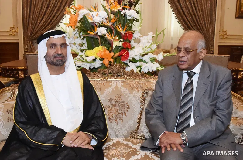 Egyptian law professor Ali Abdel-Al the newly elected speaker of Egypt's parliament meets with Ahmed bin Mohammed Al Jarwan, head of the Arab Parliament in Cairo, Egypt on Jan. 12, 2016. Photo by Stranger