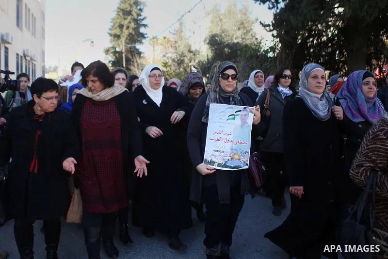 Palestinian Relatives of Mustafa al-Khatib,17, who Israeli military said was shot dead by Israeli soldiers after he tried to stab a soldier on 12 October, mourn during his funeral in the West Bank city of Ramallah, on Ja...