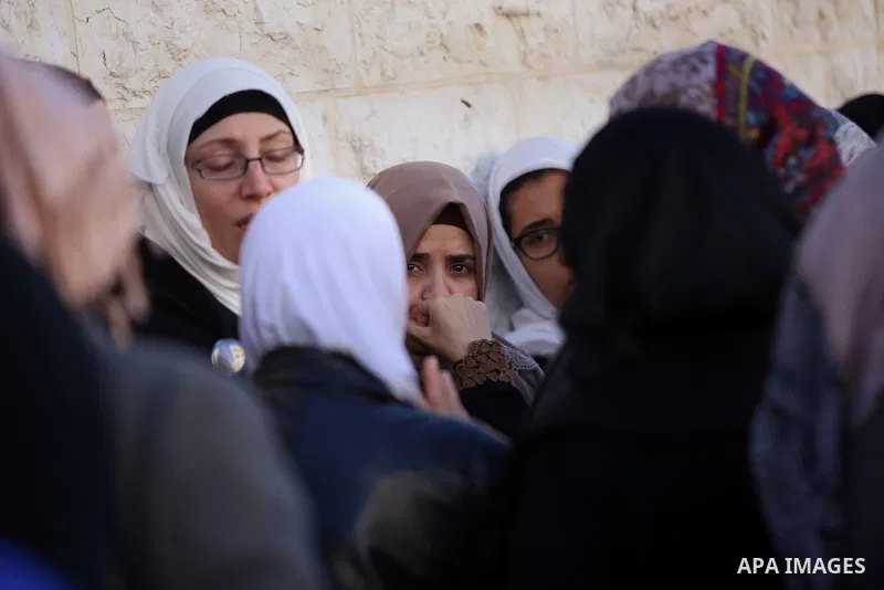 Palestinian Relatives of Mustafa al-Khatib,17, who Israeli military said was shot dead by Israeli soldiers after he tried to stab a soldier on 12 October, mourn during his funeral in the West Bank city of Ramallah, on Ja...
