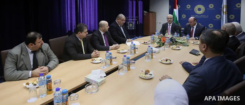 Palestinian Prime Minister Rami Hamdallah meets with members of the Board of Directors of the Monetary Authority in the West Bank city of Ramallah on Jan. 13, 2016. Photo by Prime Minister Office