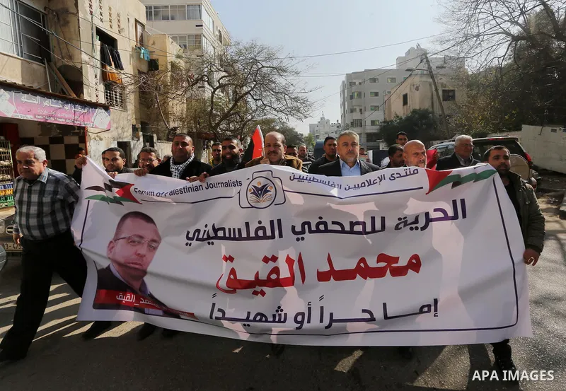 Palestinian journalists take part in a protest demanding release the Palestinian journalist Mohammed al-Qiq in Israeli jails, in front of Red cross office in Gaza city on Jan. 14, 2016. Qiq, a 33-year-old reporter for Sa...