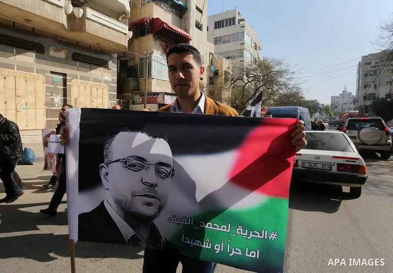 Palestinian journalists take part in a protest demanding release the Palestinian journalist Mohammed al-Qiq in Israeli jails, in front of Red cross office in Gaza city on Jan. 14, 2016. Qiq, a 33-year-old reporter for Sa...