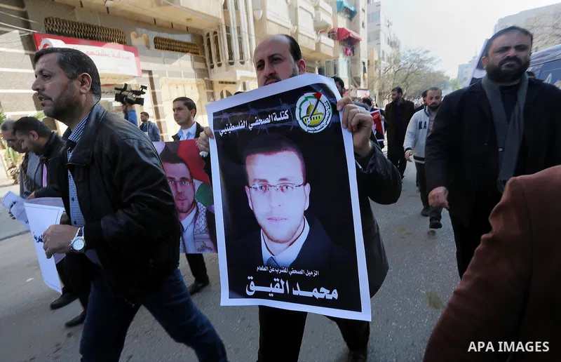 Palestinian journalists take part in a protest demanding release the Palestinian journalist Mohammed al-Qiq in Israeli jails, in front of Red cross office in Gaza city on Jan. 14, 2016. Qiq, a 33-year-old reporter for Sa...