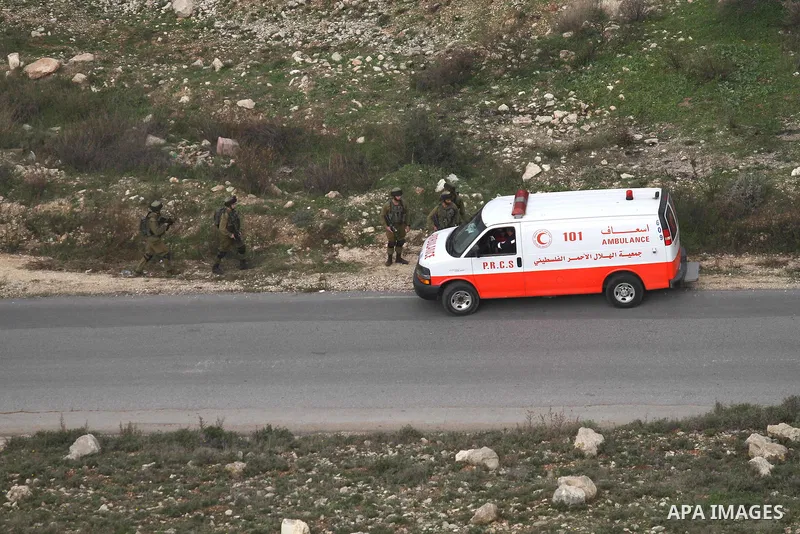 Israeli security forces monitor the site where a Palestinian man was shot dead following a reported stabbing attack in the village of Assira al-Shamaliya near the city of Nablus, in the occupied West Bank, on January 14,...