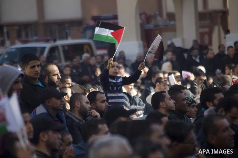 Palestinians gather at the Qatari-funded Hamad City housing complex in Khan Younis, southern Gaza Strip, Saturday, Jan. 16, 2016. More than 1,000 Palestinian families have taken possession of new apartments in the first...
