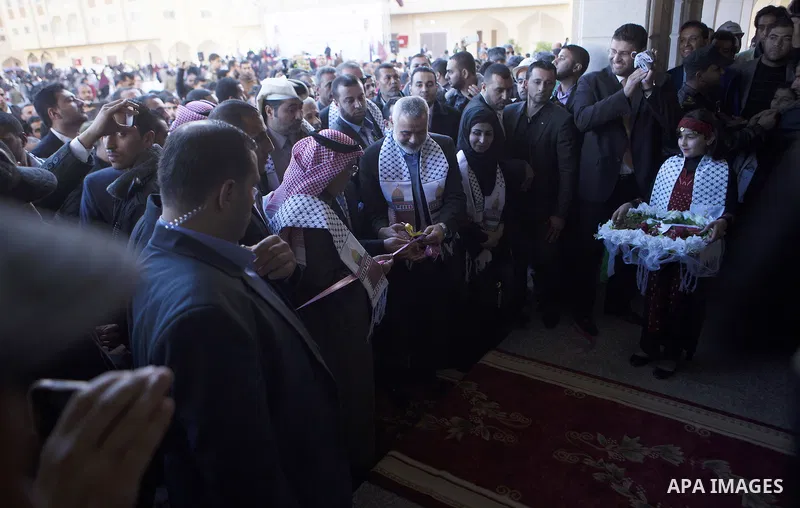 Palestinians gather at the Qatari-funded Hamad City housing complex in Khan Younis, southern Gaza Strip, Saturday, Jan. 16, 2016. More than 1,000 Palestinian families have taken possession of new apartments in the first...