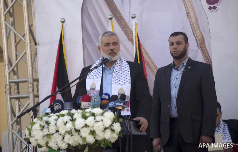 Palestinians gather at the Qatari-funded Hamad City housing complex in Khan Younis, southern Gaza Strip, Saturday, Jan. 16, 2016. More than 1,000 Palestinian families have taken possession of new apartments in the first...