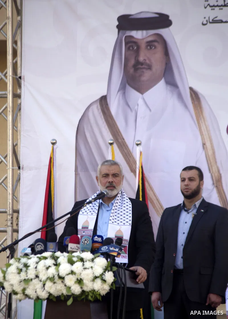 Palestinians gather at the Qatari-funded Hamad City housing complex in Khan Younis, southern Gaza Strip, Saturday, Jan. 16, 2016. More than 1,000 Palestinian families have taken possession of new apartments in the first...