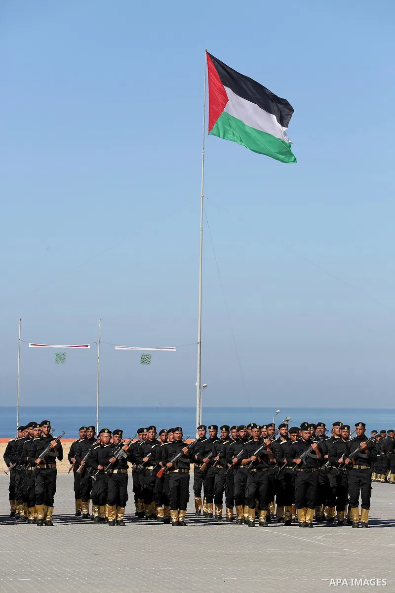 Palestinian members of officers display their skills during a graduation ceremony, in Gaza city on January 17, 2016. Photo by Mohammed Asad