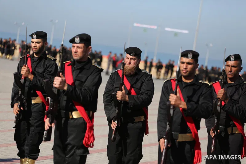 Palestinian members of officers display their skills during a graduation ceremony, in Gaza city on January 17, 2016. Photo by Mohammed Asad