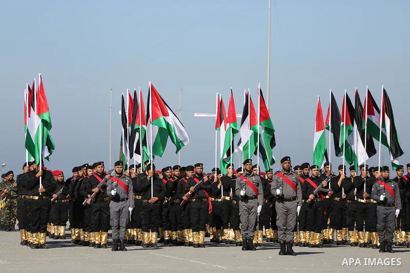 Palestinian members of officers display their skills during a graduation ceremony, in Gaza city on January 17, 2016. Photo by Mohammed Asad