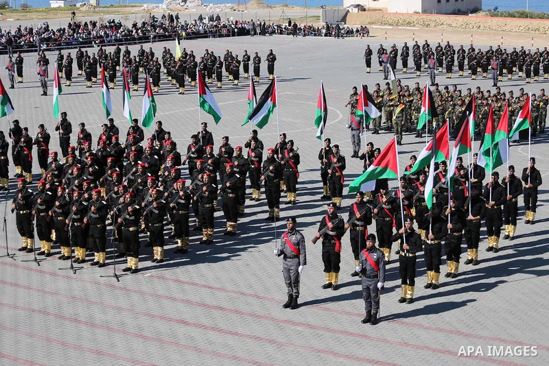 Palestinian members of officers display their skills during a graduation ceremony, in Gaza city on January 17, 2016. Photo by Mohammed Asad