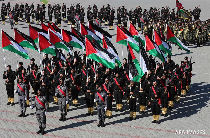Palestinian members of officers display their skills during a graduation ceremony, in Gaza city on January 17, 2016. Photo by Mohammed Asad