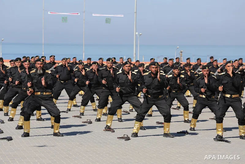 Palestinian members of officers display their skills during a graduation ceremony, in Gaza city on January 17, 2016. Photo by Mohammed Asad