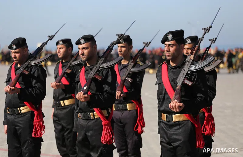Palestinian members of officers display their skills during a graduation ceremony, in Gaza city on January 17, 2016. Photo by Mohammed Asad