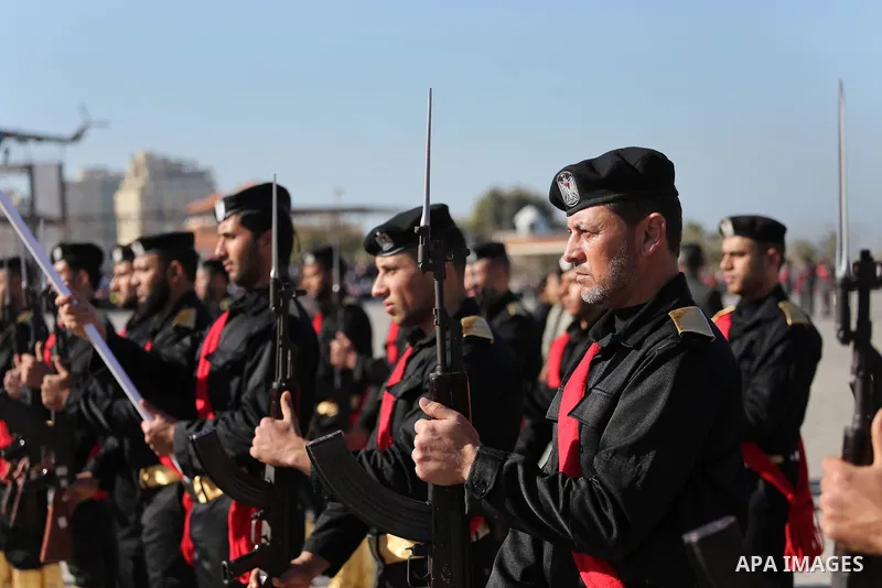 Palestinian members of officers display their skills during a graduation ceremony, in Gaza city on January 17, 2016. Photo by Mohammed Asad