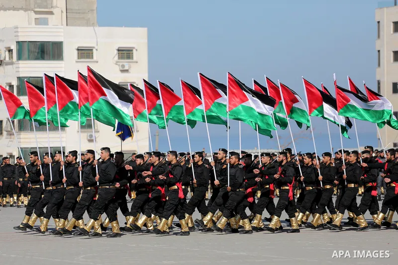 Palestinian members of officers display their skills during a graduation ceremony, in Gaza city on January 17, 2016. Photo by Mohammed Asad