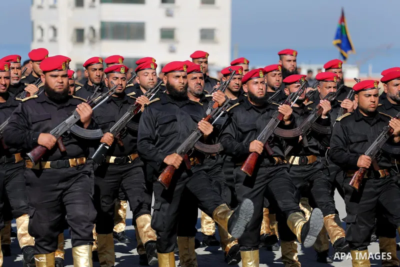 Palestinian members of officers display their skills during a graduation ceremony, in Gaza city on January 17, 2016. Photo by Mohammed Asad