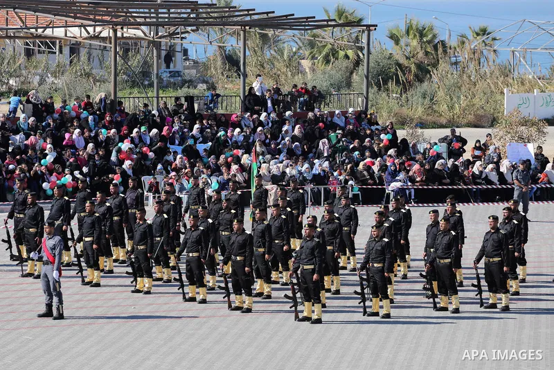 Palestinian members of officers display their skills during a graduation ceremony, in Gaza city on January 17, 2016. Photo by Mohammed Asad