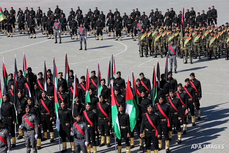 Palestinian members of officers display their skills during a graduation ceremony, in Gaza city on January 17, 2016. Photo by Mohammed Asad