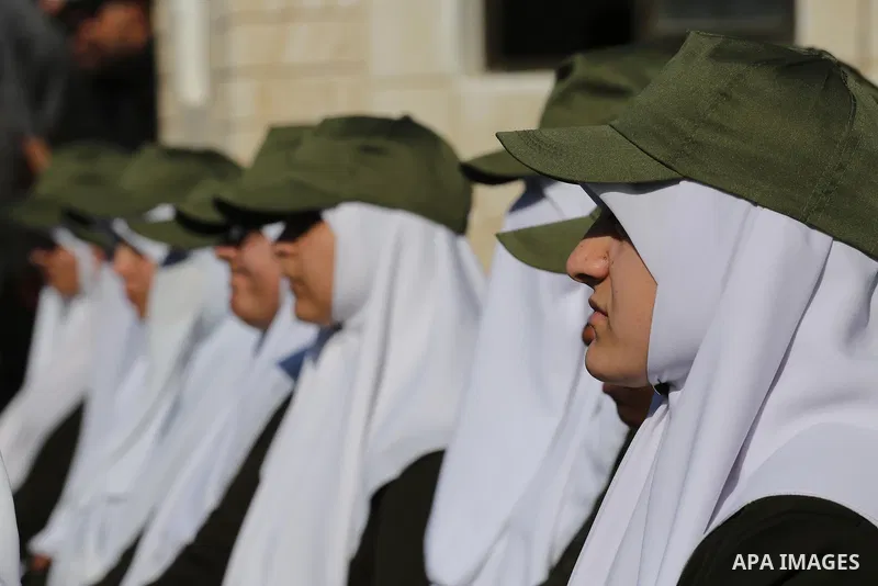Palestinian members of officers display their skills during a graduation ceremony, in Gaza city on January 17, 2016. Photo by Mohammed Asad