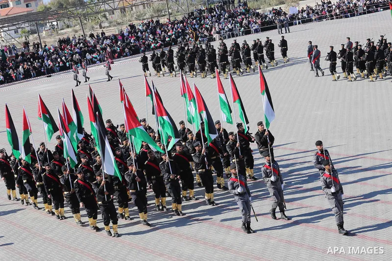Palestinian members of officers display their skills during a graduation ceremony, in Gaza city on January 17, 2016. Photo by Mohammed Asad