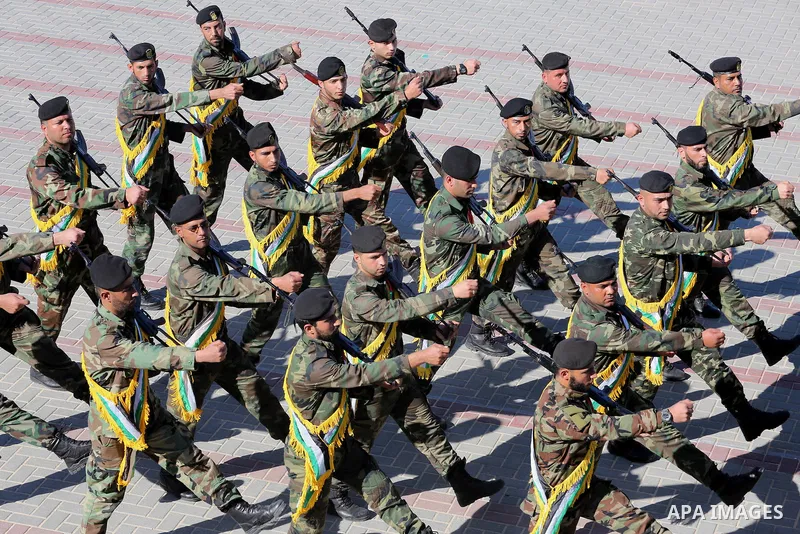 Palestinian members of officers display their skills during a graduation ceremony, in Gaza city on January 17, 2016. Photo by Mohammed Asad