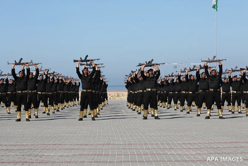 Palestinian members of officers display their skills during a graduation ceremony, in Gaza city on January 17, 2016. Photo by Mohammed Asad