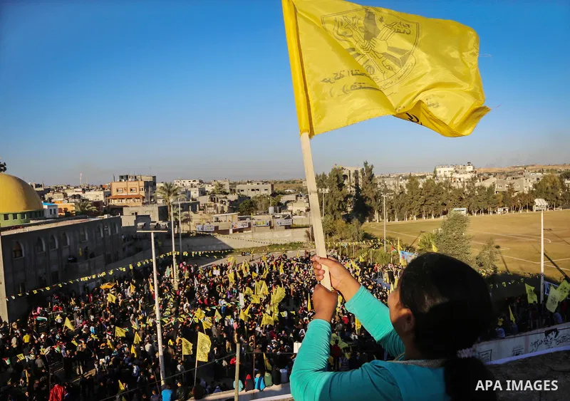 Palestinian Fatah supporters celebrate during a rally as they mark the 51st anniversary of the founding of the Fatah movement, in Beit Lahia in the northern Gaza Strip, on Jan. 17, 2016. Photo by Nidal Alwaheidi