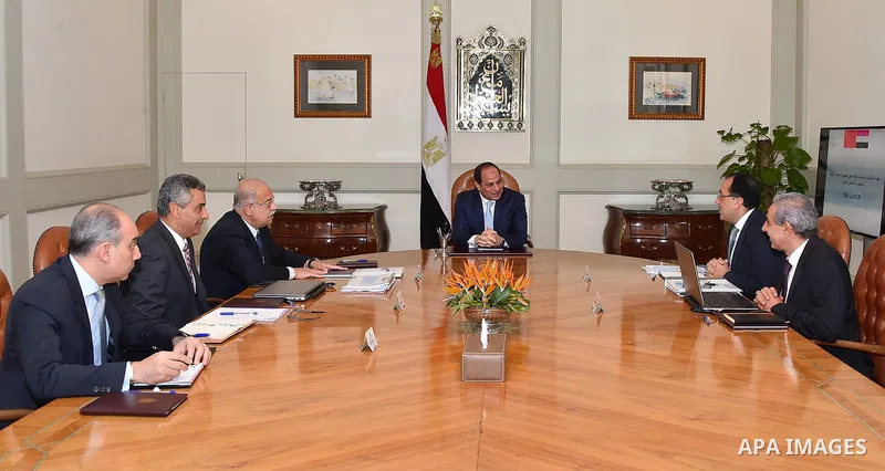 Egyptian President Abdel Fattah al-Sisi meets with Egyptian Prime minister and members of ministers in Cairo, Egypt, on Jan. 17, 2016. Photo by Egyptian President Office