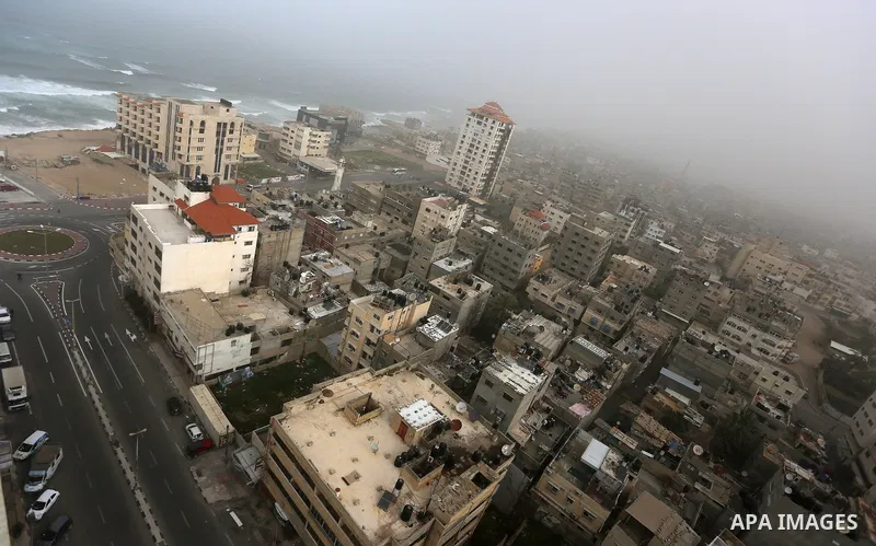 A sandstorm is seen over Gaza city on January 18, 2016. Photo by Yasser Qudih