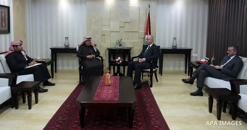 Palestinian Prime Minister, Rami Hamdallah, meets with Qatari ambassador Mohammed al-Emadi, in the West Bank city of Ramallah, on January 18, 2016. Photo by Prime Minister Office