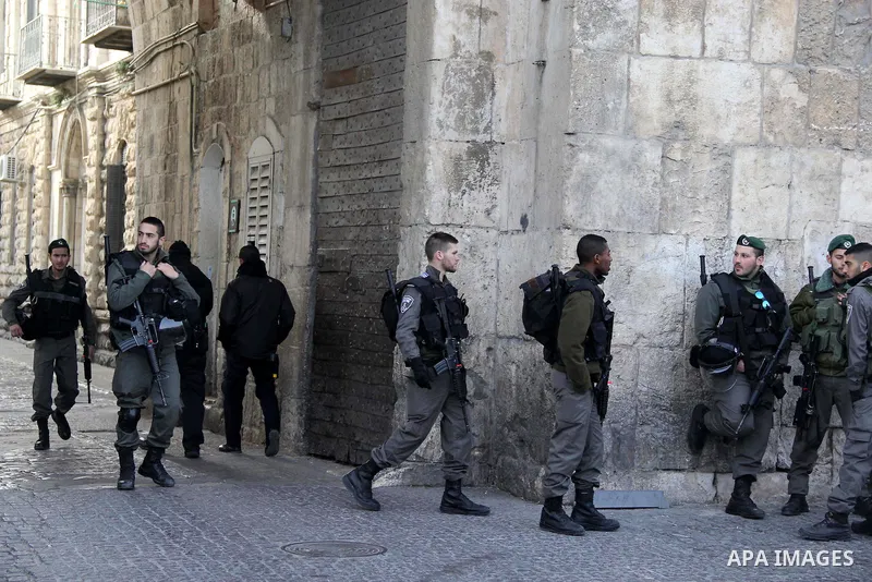 Israeli security forces stand guard at a street in Jerusalem's old city on Jan. 18, 2016. Photo by Mahfouz Abu Turk