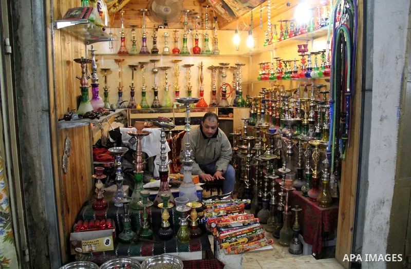 A Palestinian vendor displays goods at market in Jerusalem's old city on Jan. 18, 2016. Photo by Mahfouz Abu Turk
