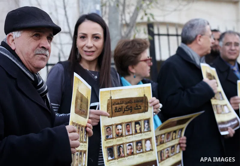 Palestinians take part in a demonstration demanding Israeli authorities to return the bodies of alleged Palestinian attackers in the West Bank city of Ramallah on Jan. 21, 2016. Photo by Shadi Hatem