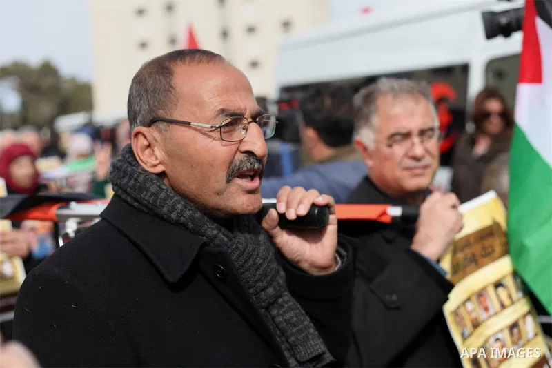 Palestinians take part in a demonstration demanding Israeli authorities to return the bodies of alleged Palestinian attackers in the West Bank city of Ramallah on Jan. 21, 2016. Photo by Shadi Hatem