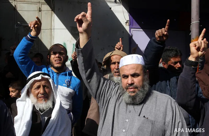 Palestinians supporting Hamas take part in a rally calling for an end to the blockade on Gaza, near the border with Egypt, in Rafah in the southern Gaza Strip, January 22, 2016. Gaza, a small impoverished coastal enclave...