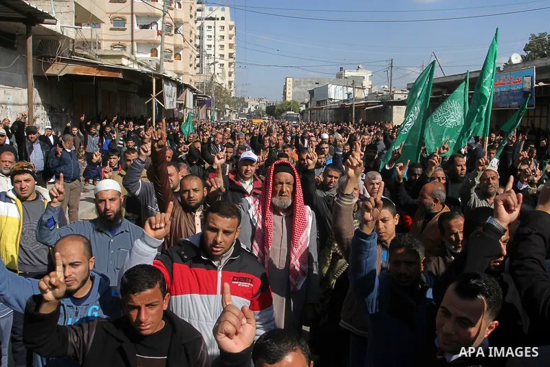 Palestinians supporting Hamas take part in a rally calling for an end to the blockade on Gaza, near the border with Egypt, in Rafah in the southern Gaza Strip, January 22, 2016. Gaza, a small impoverished coastal enclave...