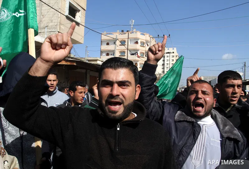 Palestinians supporting Hamas take part in a rally calling for an end to the blockade on Gaza, near the border with Egypt, in Rafah in the southern Gaza Strip, January 22, 2016. Gaza, a small impoverished coastal enclave...
