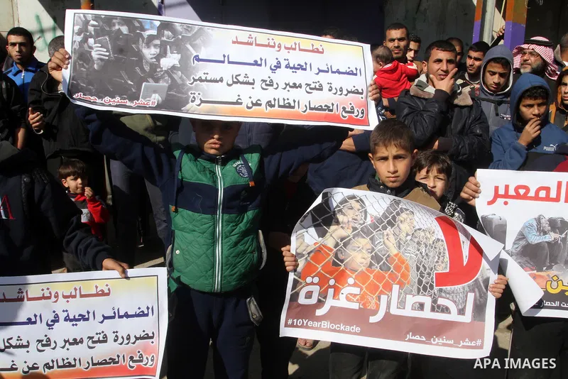 Palestinians supporting Hamas take part in a rally calling for an end to the blockade on Gaza, near the border with Egypt, in Rafah in the southern Gaza Strip, January 22, 2016. Gaza, a small impoverished coastal enclave...