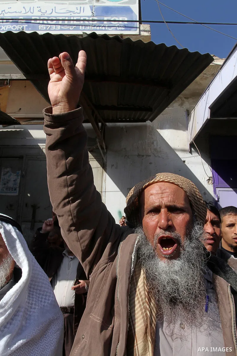 Palestinians supporting Hamas take part in a rally calling for an end to the blockade on Gaza, near the border with Egypt, in Rafah in the southern Gaza Strip, January 22, 2016. Gaza, a small impoverished coastal enclave...