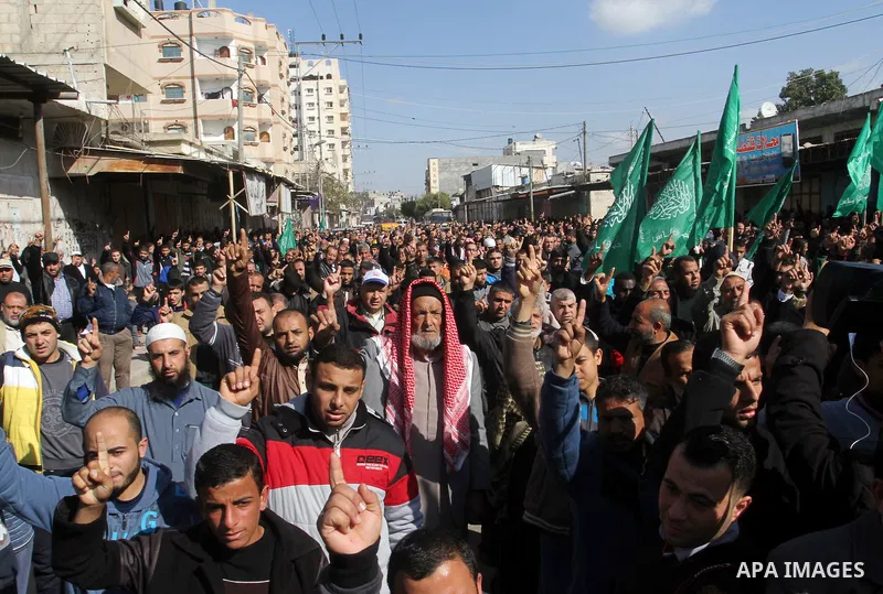 Palestinians supporting Hamas take part in a rally calling for an end to the blockade on Gaza, near the border with Egypt, in Rafah in the southern Gaza Strip, January 22, 2016. Gaza, a small impoverished coastal enclave...