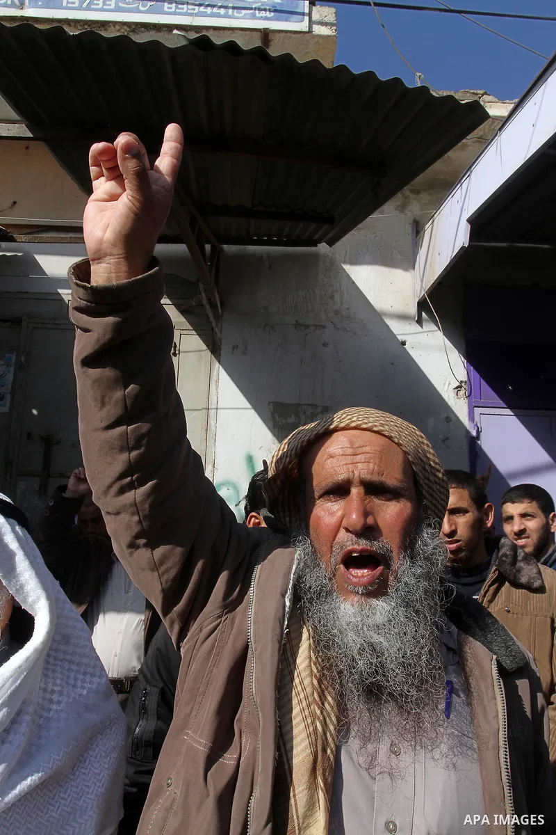 Palestinians supporting Hamas take part in a rally calling for an end to the blockade on Gaza, near the border with Egypt, in Rafah in the southern Gaza Strip, January 22, 2016. Gaza, a small impoverished coastal enclave...