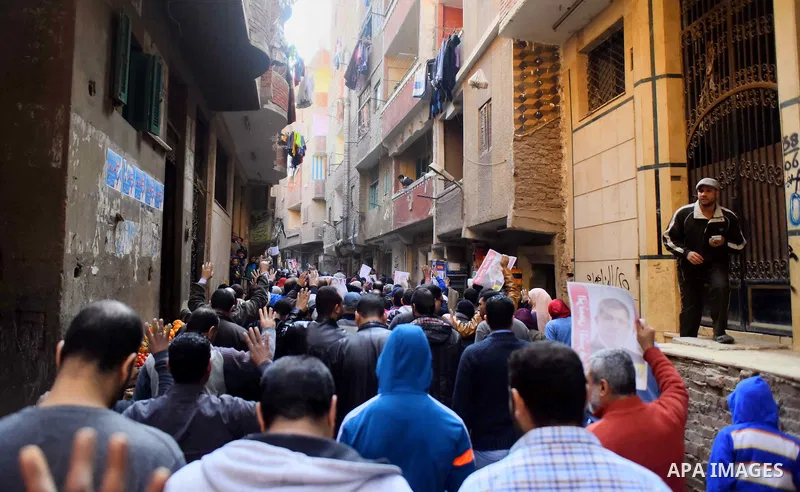 Egyptian supporters of Muslim Brotherhood and deposed President Mohamed Morsi, shot slogans during a demonstration against the President Abdel Fattah al-Sisi in Faisal district of Giza, Egypt, Jan. 22, 2016. Photo by Amr...