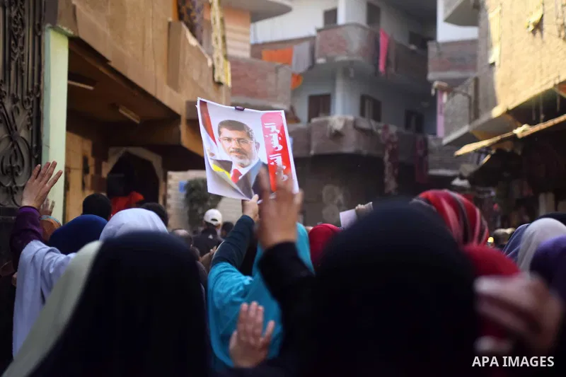 Egyptian supporters of Muslim Brotherhood and deposed President Mohamed Morsi, shot slogans during a demonstration against the President Abdel Fattah al-Sisi in Faisal district of Giza, Egypt, Jan. 22, 2016. Photo by Amr...
