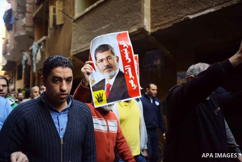 Egyptian supporters of Muslim Brotherhood and deposed President Mohamed Morsi, shot slogans during a demonstration against the President Abdel Fattah al-Sisi in Faisal district of Giza, Egypt, Jan. 22, 2016. Photo by Amr...