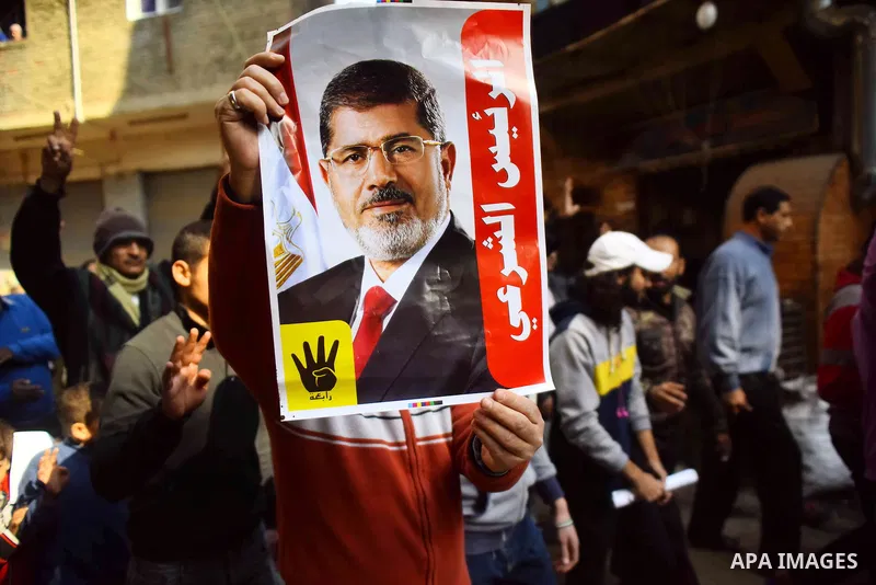 Egyptian supporters of Muslim Brotherhood and deposed President Mohamed Morsi, shot slogans during a demonstration against the President Abdel Fattah al-Sisi in Faisal district of Giza, Egypt, Jan. 22, 2016. Photo by Amr...