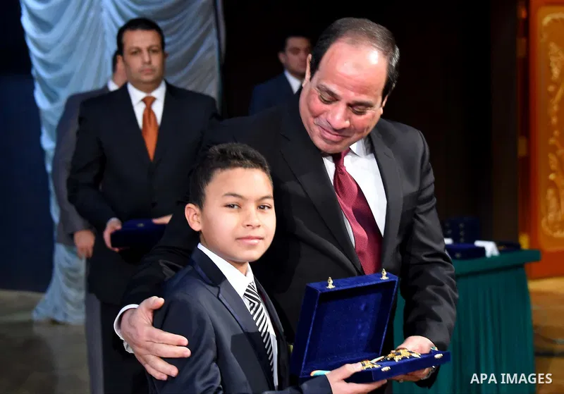 Egyptian President Abdel-Fattah el-Sissi takes part in a ceremony marking Police Day, which falls on Jan. 25, the anniversary of the 2011 uprising that toppled longtime ruler Hosni Mubarak, in Cairo, Egypt, Saturday, Jan...